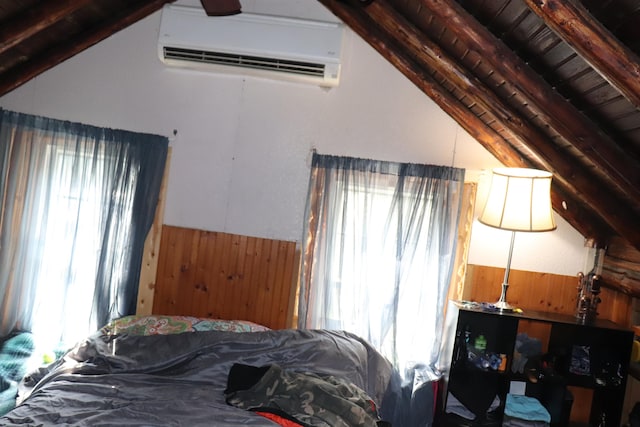 bedroom with an AC wall unit, wood walls, lofted ceiling with beams, and wood ceiling