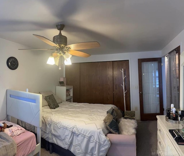 carpeted bedroom with ceiling fan