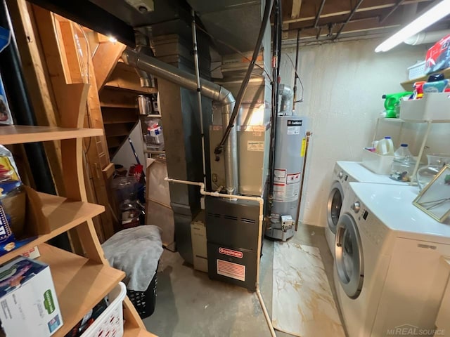 utilities featuring gas water heater and washer and clothes dryer