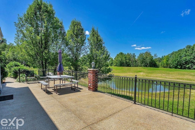 view of patio / terrace with a water view