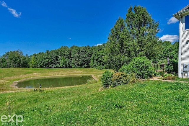 view of yard with a water view