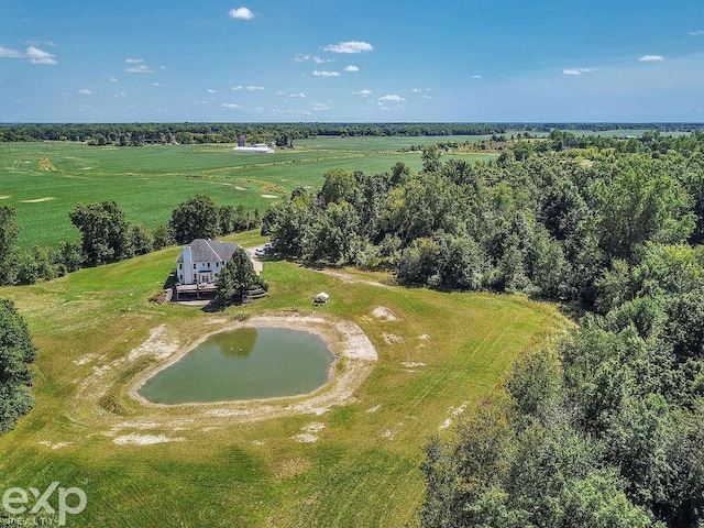 drone / aerial view featuring a rural view and a water view