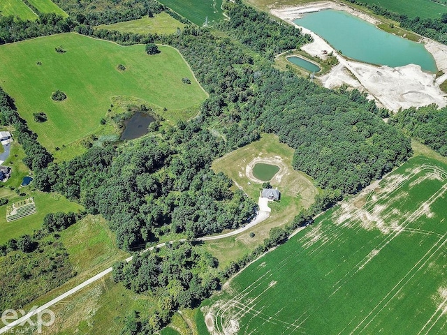 bird's eye view featuring a water view and a rural view