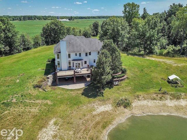 drone / aerial view with a rural view and a water view