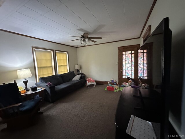 bedroom with carpet flooring, ceiling fan, and a paneled ceiling