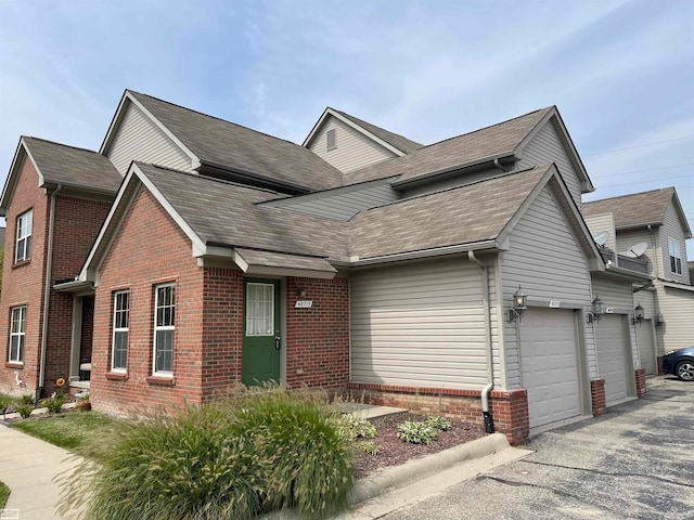 front facade with a garage