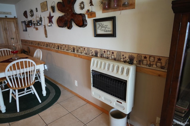 dining area with light tile patterned flooring