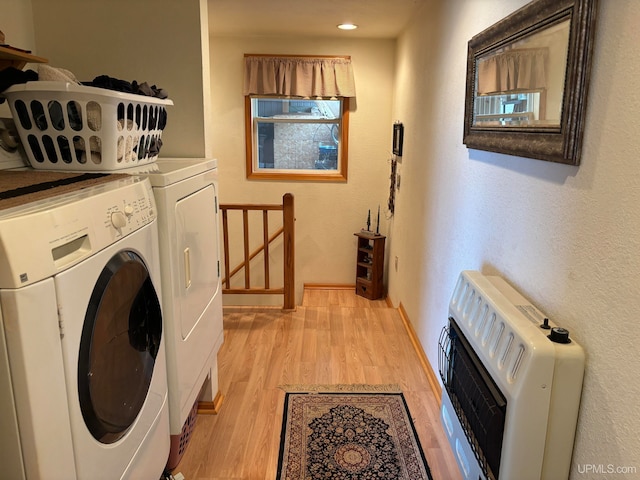 washroom featuring light hardwood / wood-style floors and independent washer and dryer