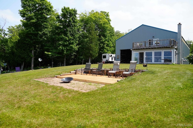 view of yard featuring a wooden deck