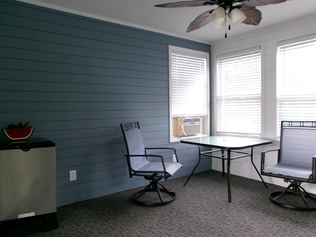 sunroom / solarium with ceiling fan and cooling unit