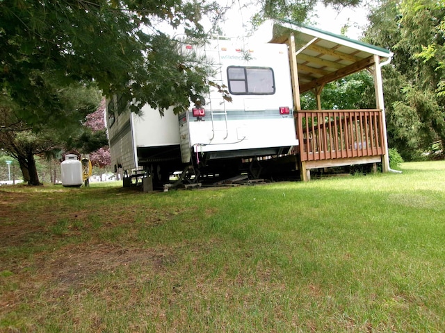 view of yard with a carport