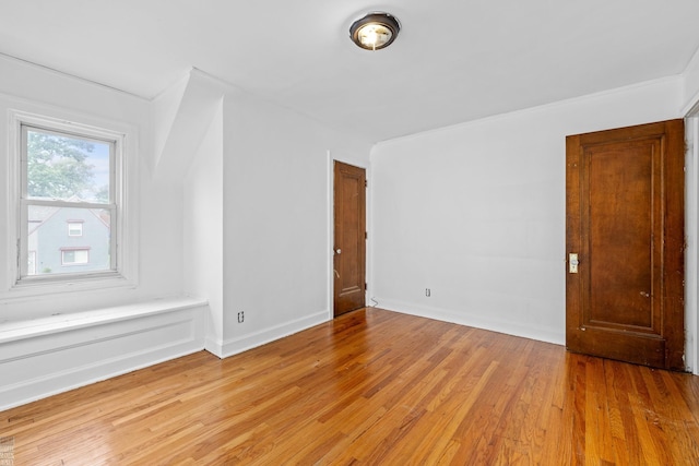 unfurnished room featuring light hardwood / wood-style flooring