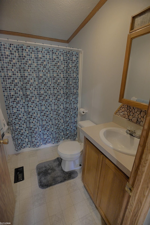 full bathroom featuring vanity, a textured ceiling, shower / bathtub combination with curtain, toilet, and ornamental molding