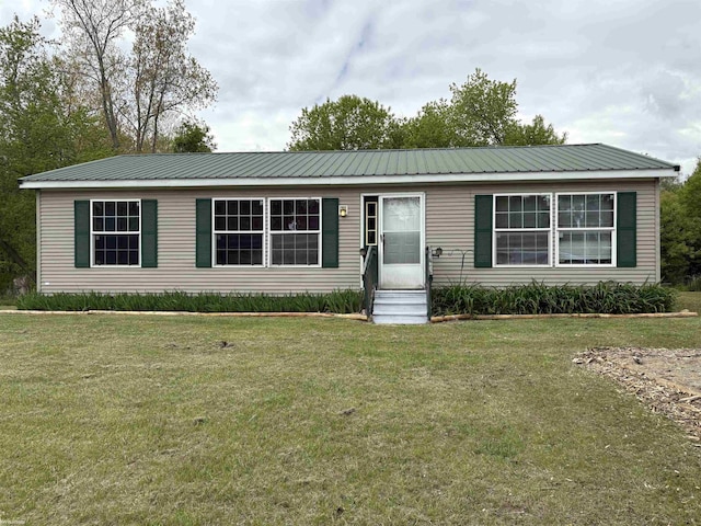3679 Lakeshore Rd, Deckerville, MI 48427 - view of front of property with entry steps, a front lawn, and metal roof