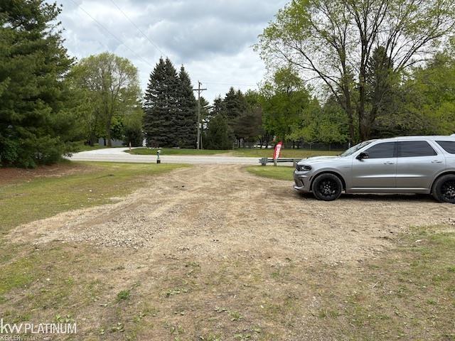 3679 Lakeshore Rd, Deckerville, MI 48427 - view of dirt / gravel road