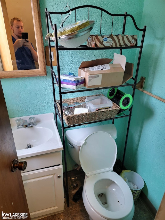 bathroom with tile patterned flooring and vanity