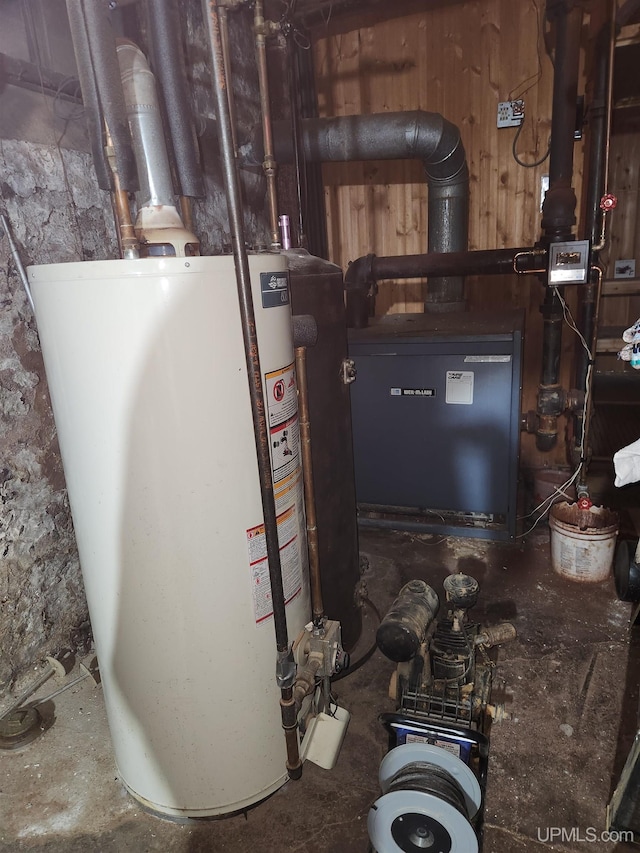 utility room with gas water heater