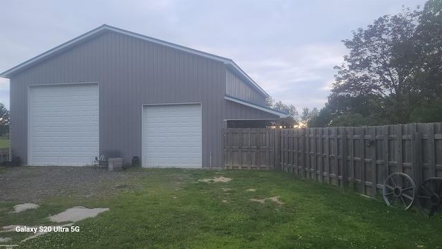 garage with a lawn