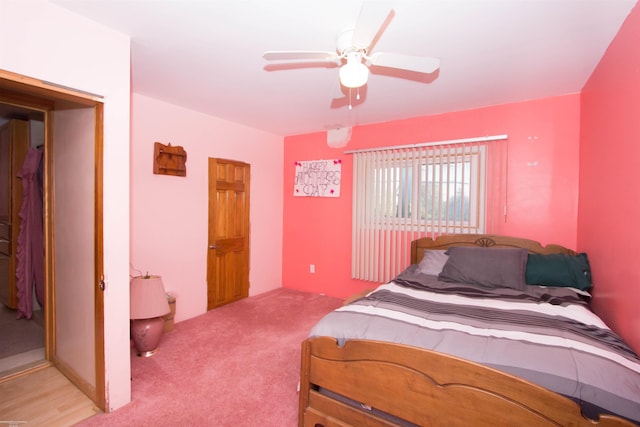 bedroom with ceiling fan and carpet