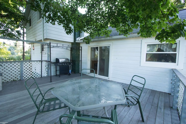 wooden terrace with grilling area