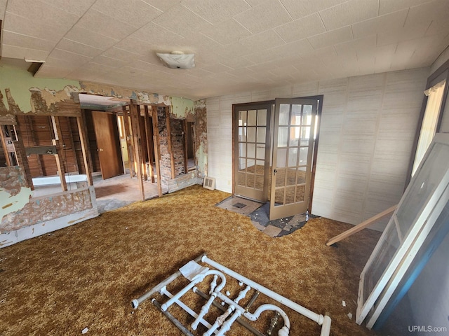 misc room featuring carpet and french doors