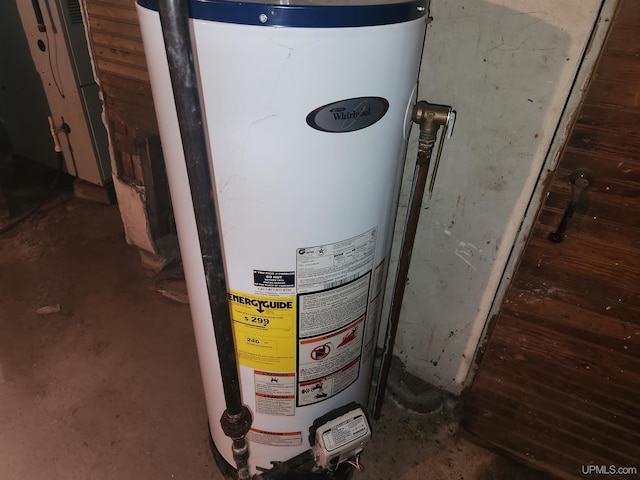 utility room with gas water heater