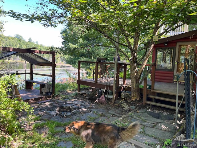 view of yard with a wooden deck