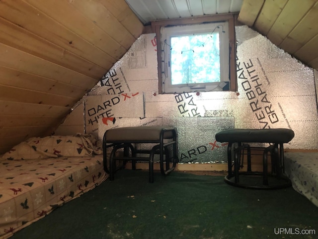 unfurnished bedroom with vaulted ceiling