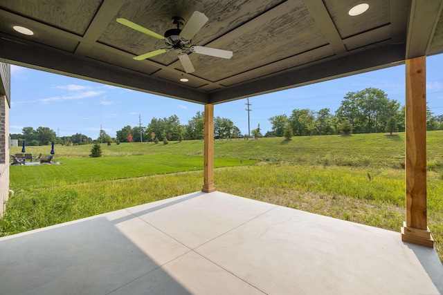 view of patio / terrace featuring a rural view and ceiling fan