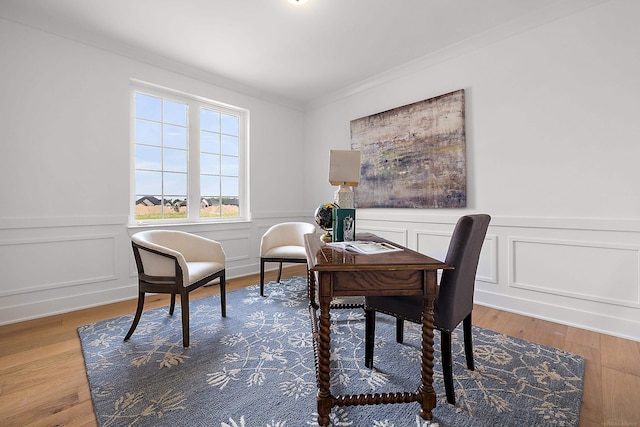 office area featuring crown molding and wood-type flooring