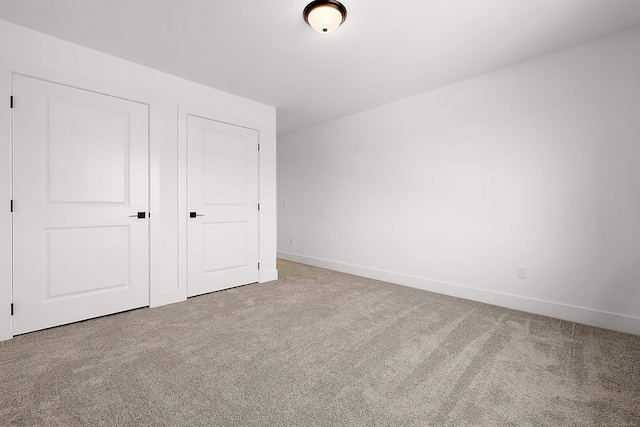 unfurnished bedroom featuring carpet