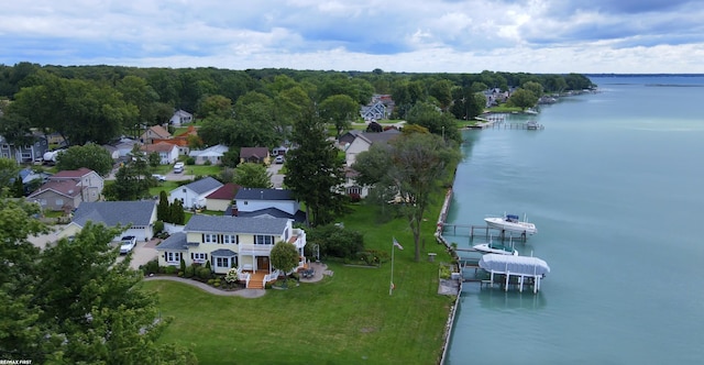 birds eye view of property featuring a water view and a residential view