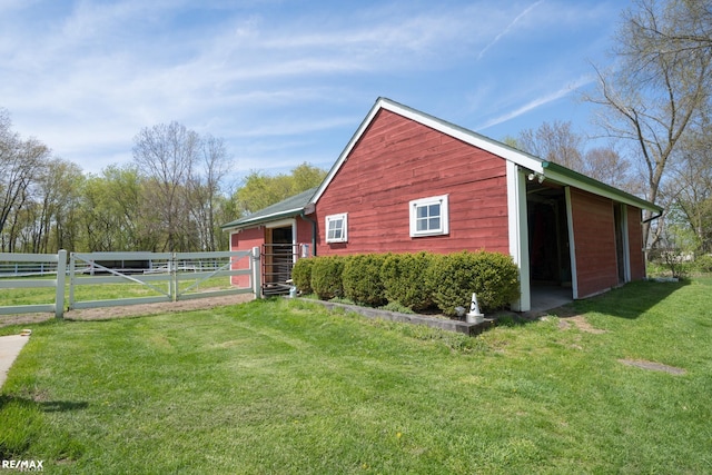 view of outdoor structure with a lawn