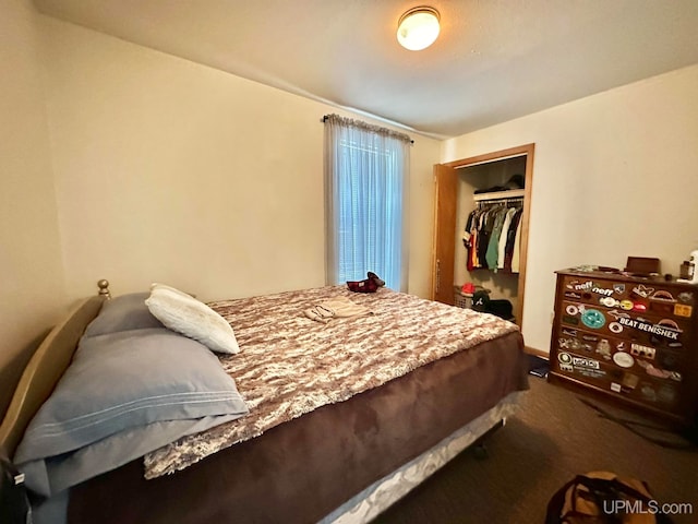 bedroom featuring a closet and carpet flooring