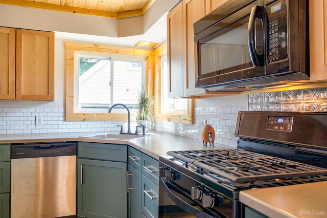 kitchen with gas range, decorative backsplash, and stainless steel dishwasher