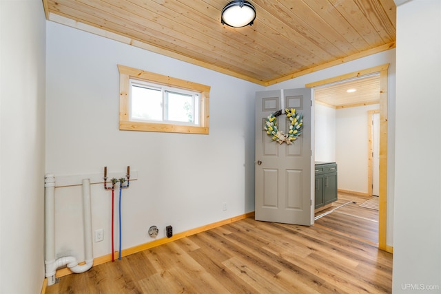 empty room featuring wooden ceiling and light hardwood / wood-style flooring