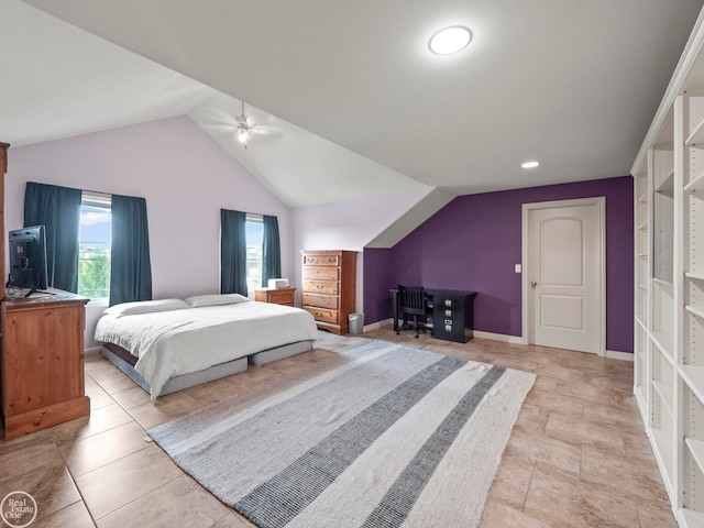 bedroom featuring light tile patterned floors and vaulted ceiling