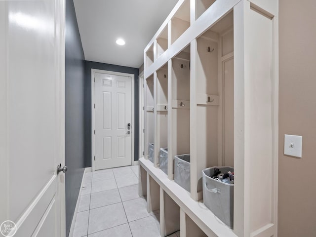 mudroom with light tile patterned flooring