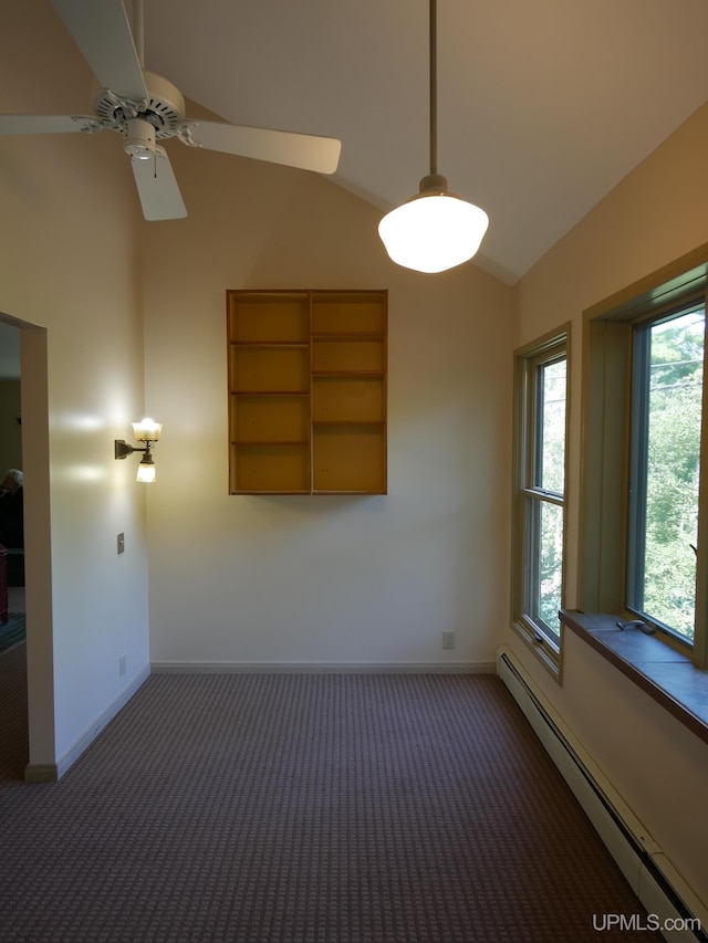 spare room featuring ceiling fan, carpet floors, lofted ceiling, and a baseboard heating unit