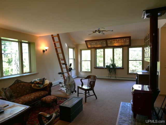 living room featuring carpet flooring, ceiling fan, and baseboard heating