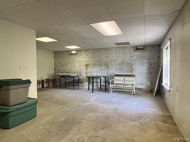 below grade area with a paneled ceiling