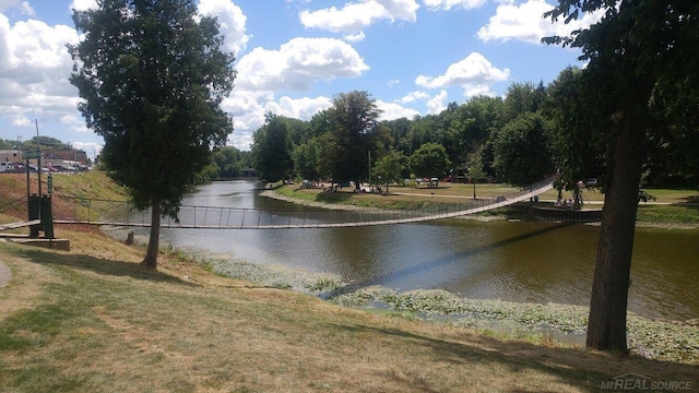 view of water feature with fence