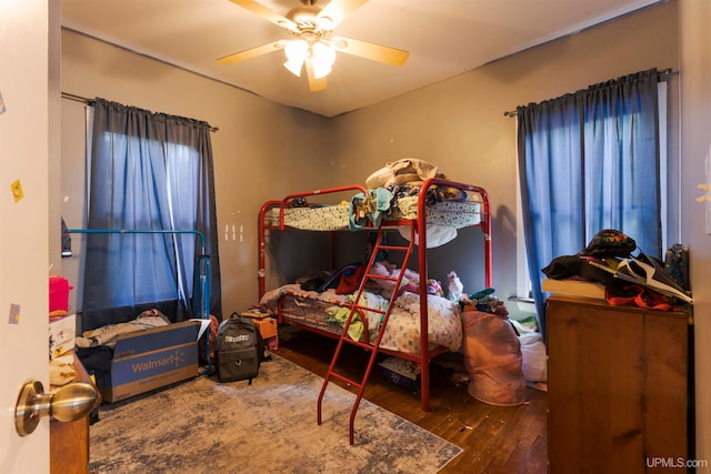 bedroom featuring hardwood / wood-style floors and ceiling fan