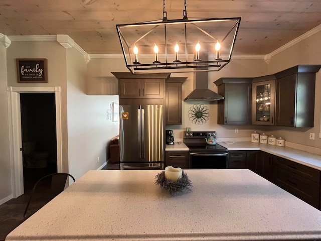 kitchen featuring dark brown cabinets, wall chimney range hood, crown molding, black range with electric cooktop, and stainless steel fridge