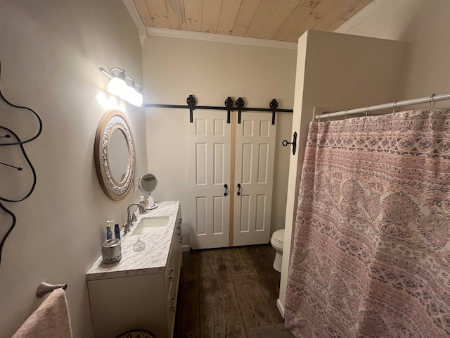 bathroom with wood ceiling, vanity, crown molding, toilet, and hardwood / wood-style floors