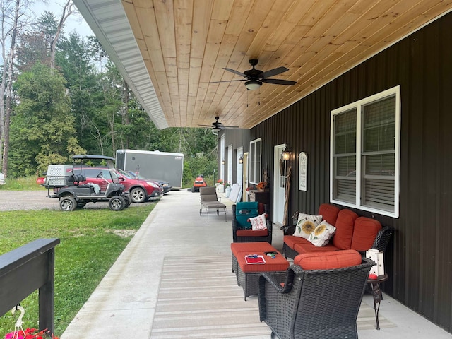 view of patio / terrace with an outdoor living space and ceiling fan