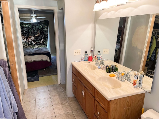 bathroom with vanity, ceiling fan, and tile patterned floors