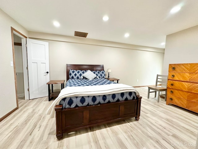 bedroom with light wood-type flooring