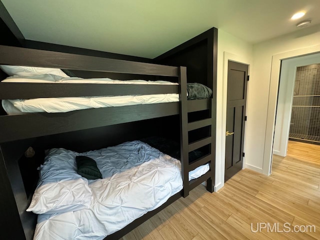 bedroom featuring light hardwood / wood-style floors