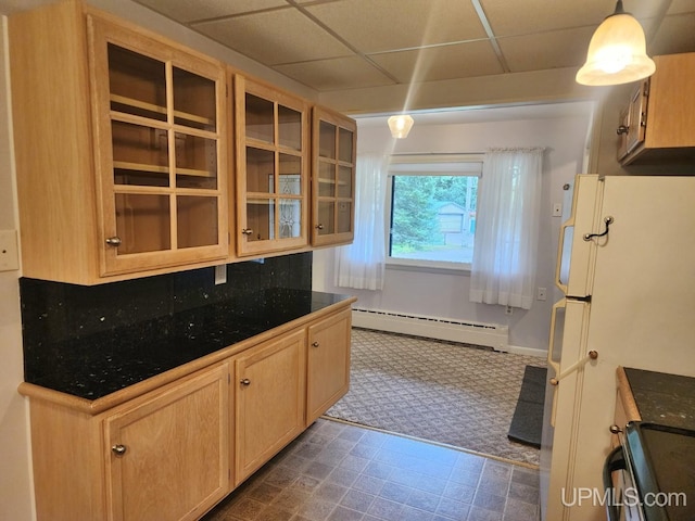 kitchen with backsplash, tile patterned flooring, baseboard heating, a paneled ceiling, and pendant lighting